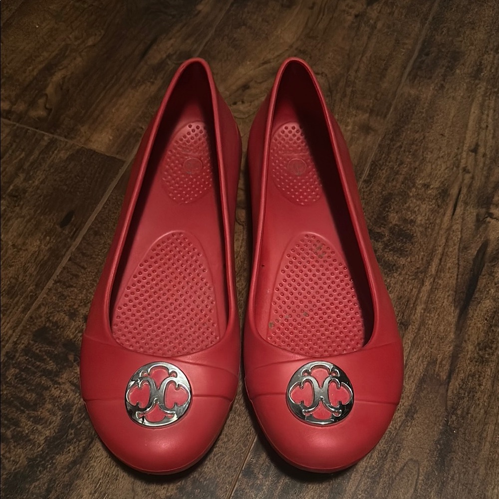 Red Crocs flats with silver Accent